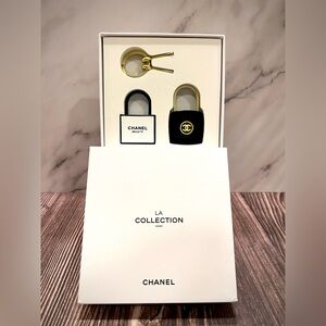 CHANEL Black and Gold Padlock Duo